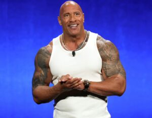 The Rock presenting on stage