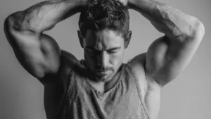 High-quality bodybuilder flexing muscles, emphasizing strength and fitness, ideal for Trusted SARMs supplement promotion and muscle building.