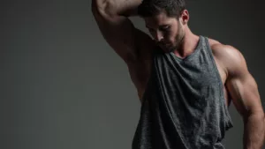 man flexing in studio